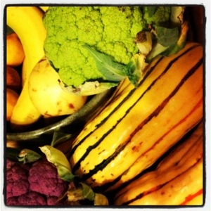 Pears and bananas gone by with new Delicata squash and purple and green cauliflower
