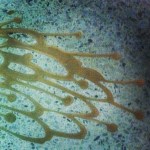 Golden mollusks and sea creatures on floor of Miami International Airport