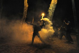 Youth we know protesting near Dolmabahce Cami in Bekistas - one is throwing a gas cannister back towards police (Image by Scott Peterson/Getty Images)