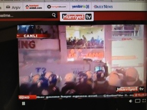This shows police gassing people in and near the Simit Sarayi (Simit Palace, a sort of bagel-like shop) where M. and I usually stop for a snack before walking Istiklal Caddesi. (Image is screen capture by Liz Cameron)
